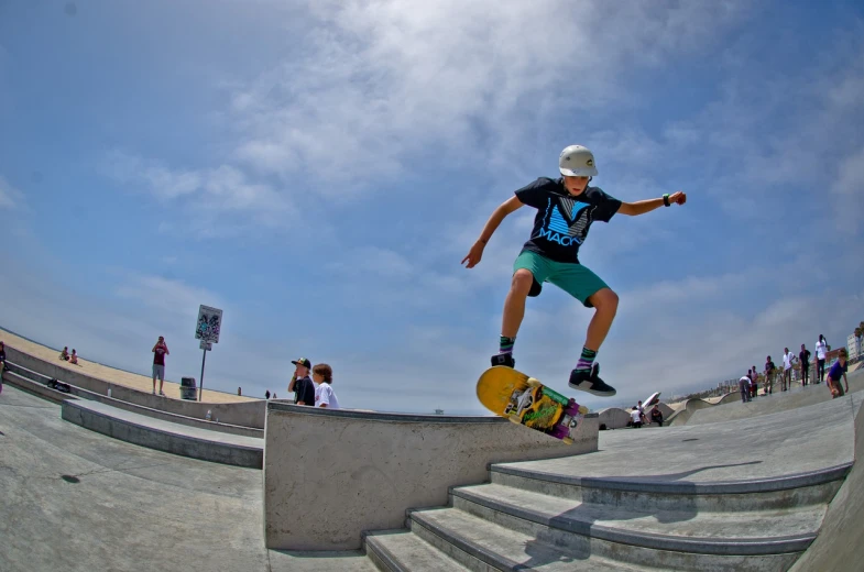 a man flying through the air while riding a skateboard, a picture, by Scott M. Fischer, shutterstock, oceanside, 2011, wide angle shots, bench