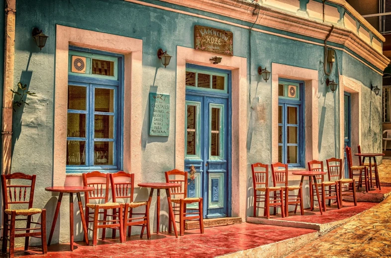 a row of wooden chairs sitting outside of a building, a photo, trending on pixabay, art nouveau, a multidimensional cozy tavern, azure and red tones, greek setting, pastelcolours