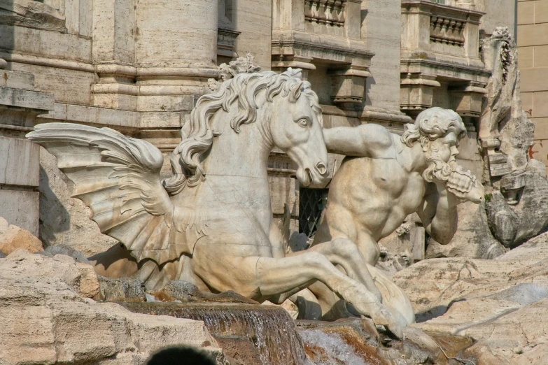 a statue of a winged horse in front of a fountain, inspired by Gian Lorenzo Bernini, shutterstock, camaraderie, colosseum, seen from the side, cascade