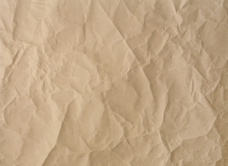 a close up of a piece of paper on a table, by Viktor de Jeney, tumblr, tileable texture, light brown background, lively irregular edges, high detail product photo