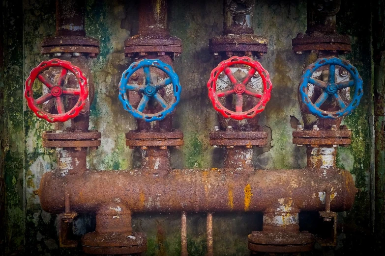 a bunch of pipes with red and blue valves, flickr, assemblage, water wheel, post processed denoised, bleeding decaying colors!, knobs