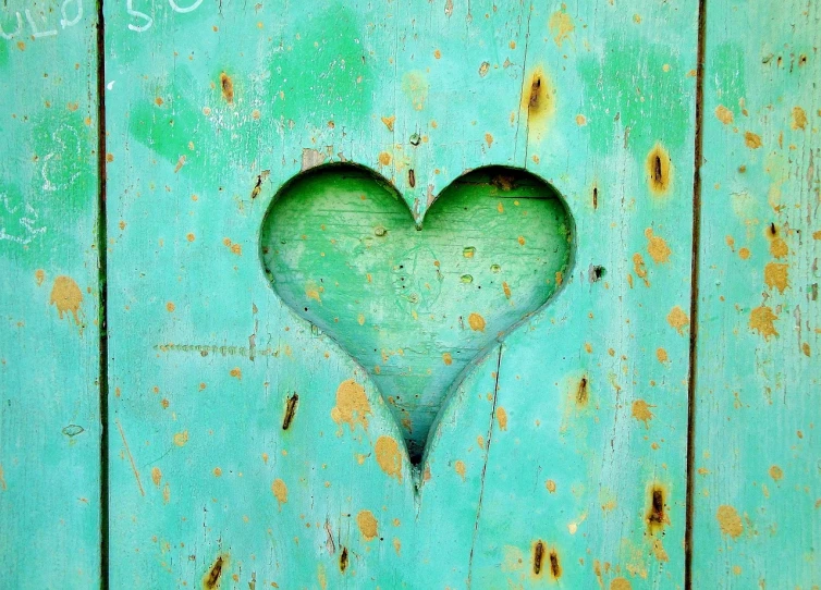 a heart shaped hole in the side of a wooden door, inspired by Jim Dine, featured on pixabay, sea green color theme, 5 0 0 px, trending on deviantarthq”, skin painted with green