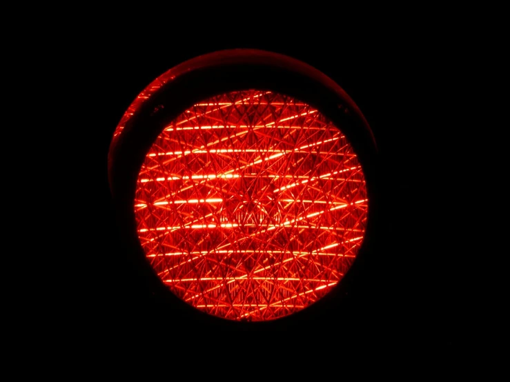 a close up of a traffic light in the dark, flickr, a large sphere of red energy, naoto fukasawa, bottom view, version 3