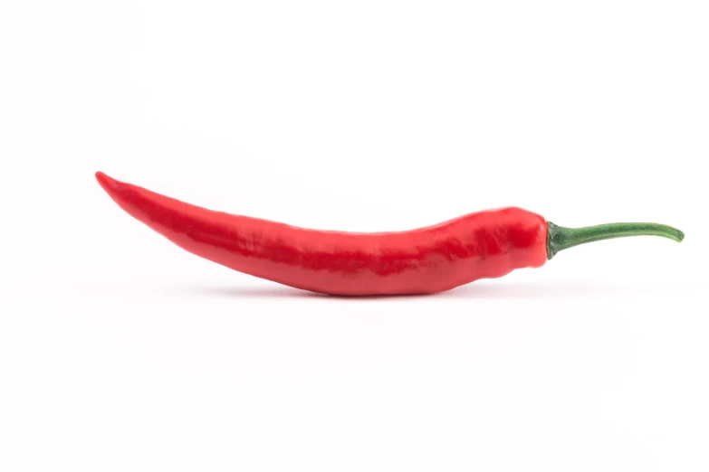 a red hot pepper on a white background, a picture, by Juan O'Gorman, pexels, rasquache, super long shot, istockphoto, long nose, hua cheng