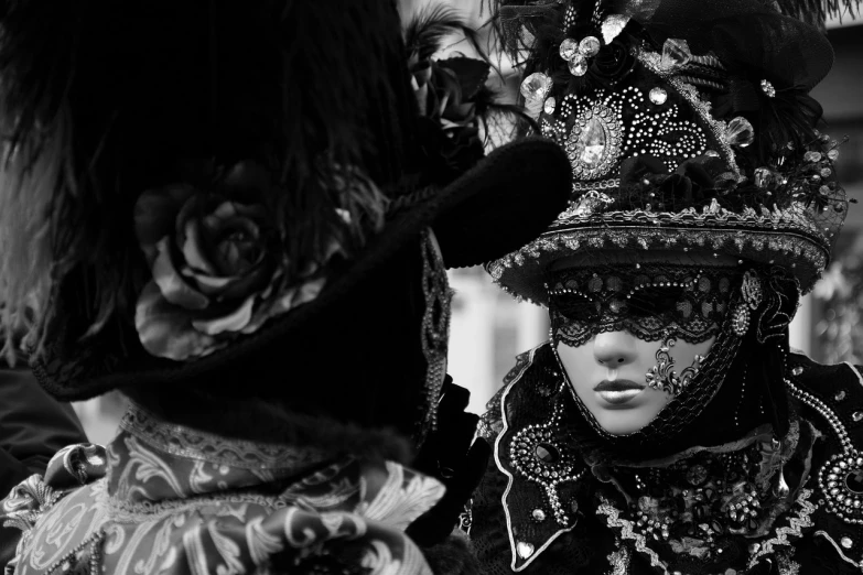 a close up of a person wearing a costume, a black and white photo, by Mirabello Cavalori, tumblr, venice, taken with sony alpha 9, elaborate composition, private moment