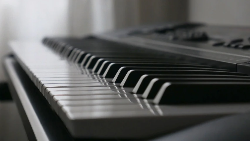 a close up view of a piano keyboard, a picture, inspired by Kawai Gyokudō, pexels, digital art, 4k vertical wallpaper, benjamin vnuk, soft light from the side, devices and instruments