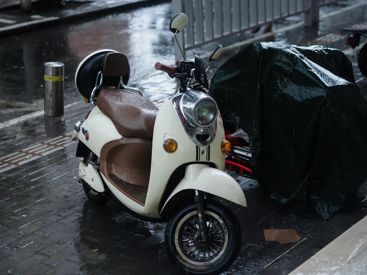 a motor scooter parked on the side of the road, a picture, neo-dada, rainy and wet atmosphere, soft white rubber, shanghai, antique