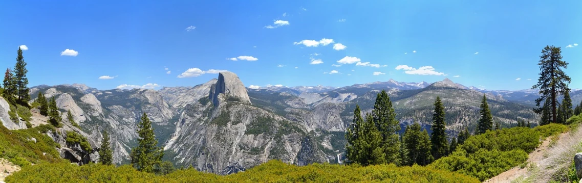 a view of the mountains from the top of a mountain, by Randall Schmit, trending on pixabay, yosemite valley, bright summer day, seen from the side, 🌲🌌