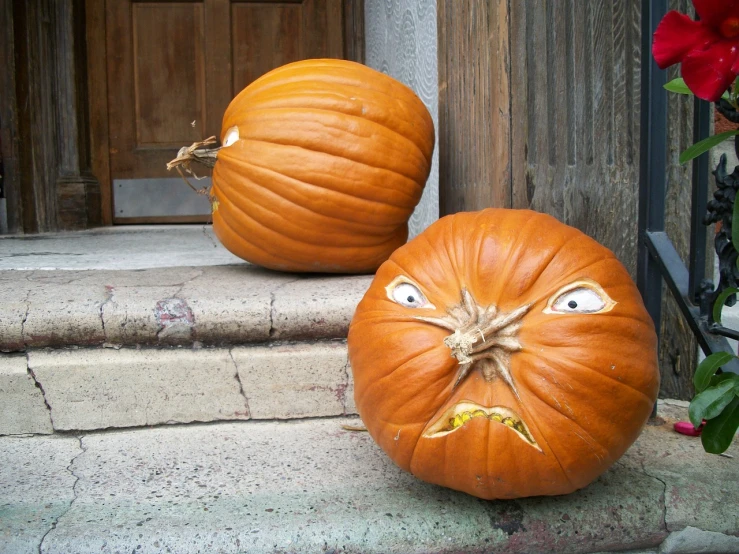 two pumpkins sitting on the steps of a house, by Heinz Anger, auto-destructive art, winking one eye, grumpy, diy, stalk eyes