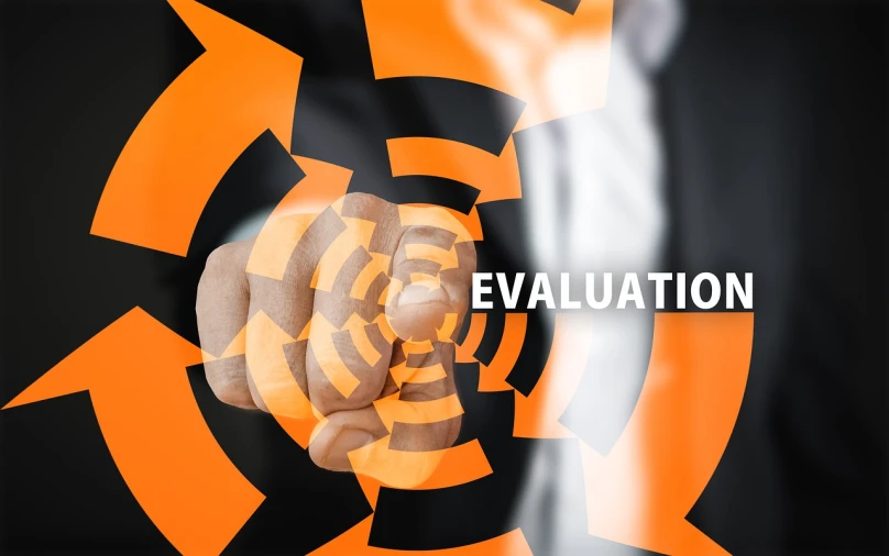 a man in a suit pointing at the word evaluation, a digital rendering, by Giorgio Cavallon, pixabay, institutional critique, orange extremely coherent, round-cropped, product introduction photo, stock photo