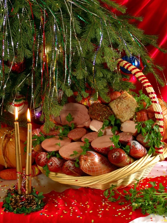 a basket filled with lots of food next to a christmas tree, a photo, art nouveau, meat texture, 2 0 1 0 photo, poland, plan