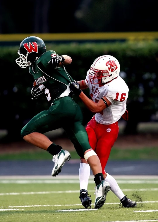 a couple of men playing a game of football, by Paul Davis, shutterstock, green and red, from wheaton illinois, high school, battle action shot