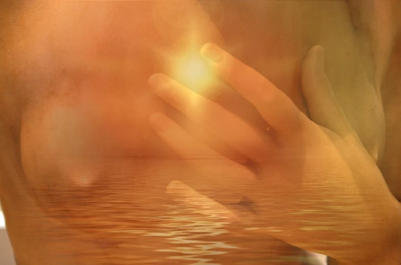 a close up of a person's hand near a body of water, digital art, romanticism, golden glow, worship, sunraise, message