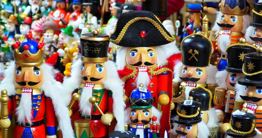 a group of nutcrackers sitting next to each other, by Matthias Weischer, pexels, folk art, pirates, intricate foreground, eyes!, military