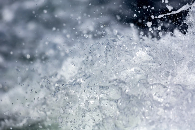 a man riding a wave on top of a surfboard, by Thomas Häfner, unsplash, digital art, covered in water drops, detailed zoom photo, abstract white fluid, high detailed close up of