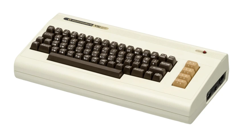 a close up of a computer keyboard on a white surface, by Edward Avedisian, computer art, brown and cream color scheme, video game consoles, super model-s 100, retro cover