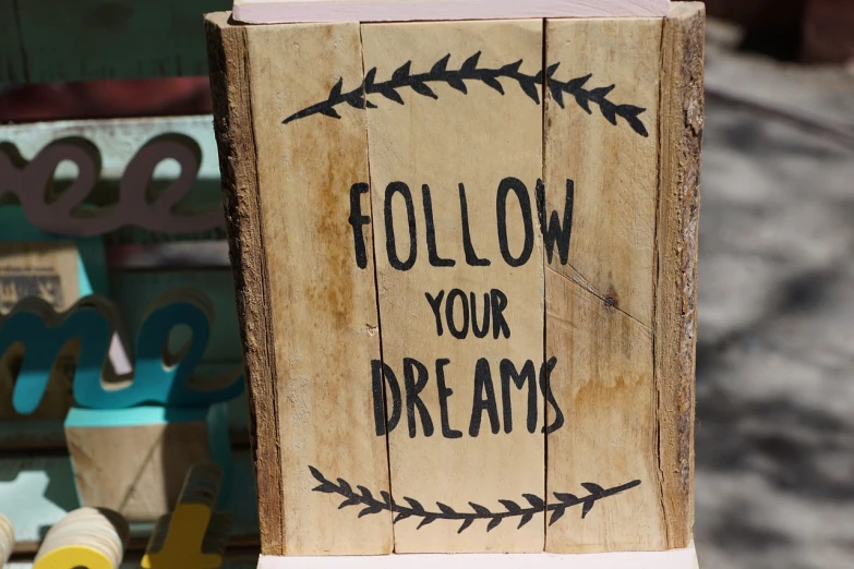 a wooden sign that says follow your dreams, a picture, 🎨🖌️, dream ethnology, how to, albuquerque
