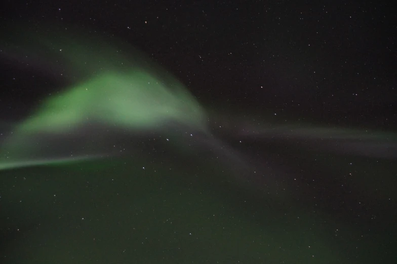 a plane that is flying in the sky, by Ejnar Nielsen, hurufiyya, aurora, curved horns!, thin horizontal nebula, not cropped