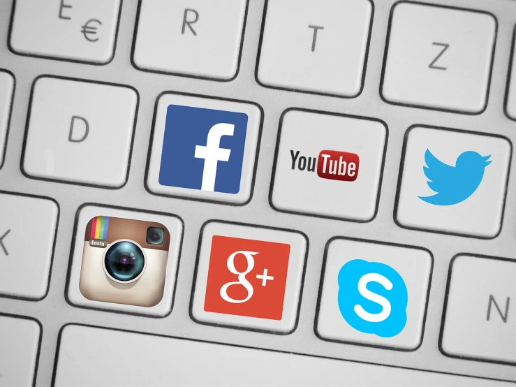 a keyboard with several social icons on it, a picture, shutterstock, youtube thumbnail, closeup photo, stock photo