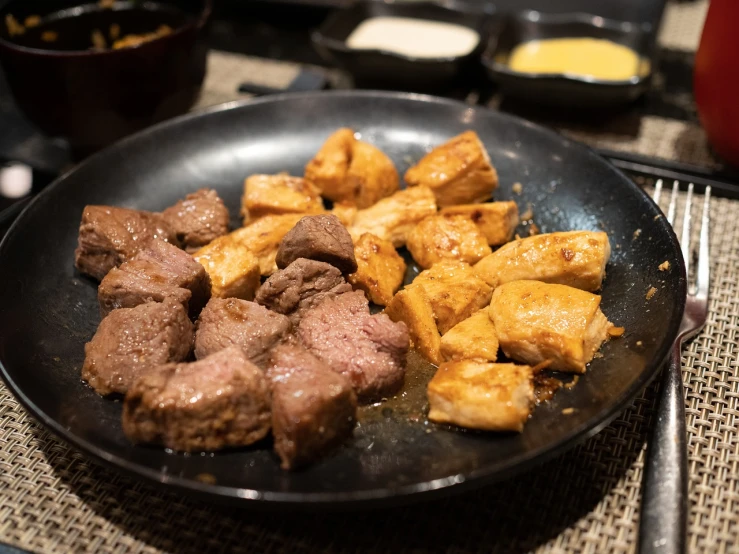 a close up of a plate of food on a table, dau-al-set, meat texture, chozo, grill, russian and japanese mix