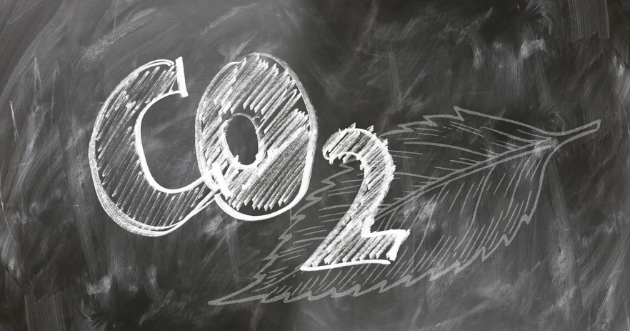 a blackboard with the word co2 written on it, a charcoal drawing, pixabay, avatar image, 2 colours, ecopunk, f2.2