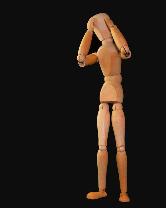 a wooden mannequin standing in front of a black background, by Richard Carline, pixabay, frustrated detailed, articulated joints, tiny person watching, an ahoge stands up on her head