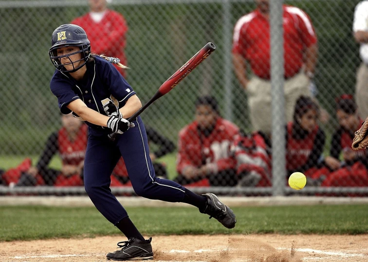 a baseball player swinging a bat at a ball, pixabay, teen girl, navy, 2 0 0 0's photo, ap news photo