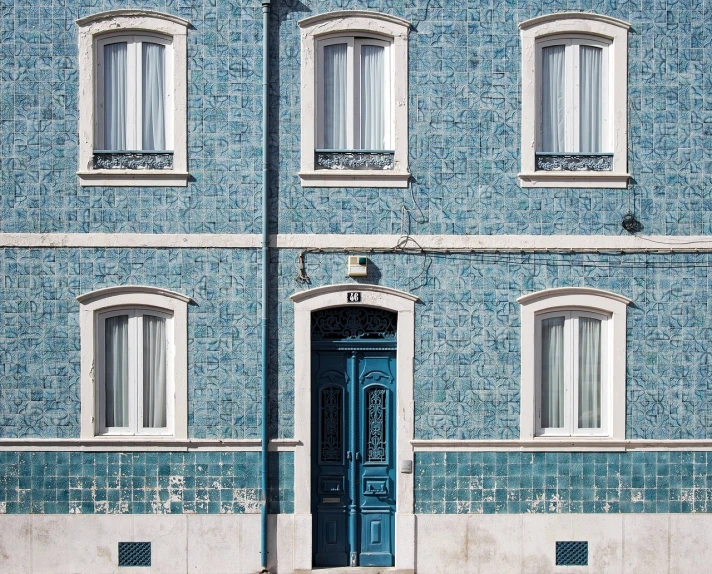 a blue and white building with a blue door, a mosaic, by Matthias Weischer, shutterstock, nazare (portugal), shot of a highly detailed, urban house, flat texture