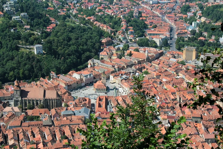 a view of a city from the top of a hill, a picture, inspired by Slava Raškaj, renaissance, img _ 9 7 5. raw, town square, ham, bottom angle