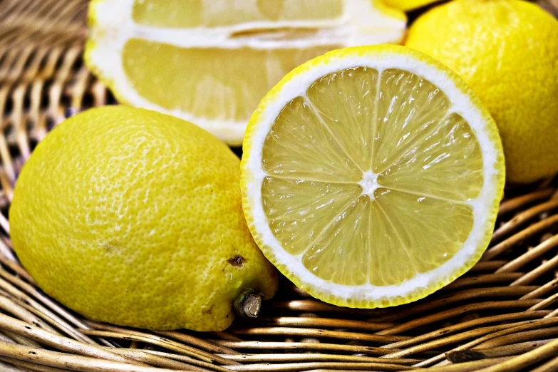 a bunch of lemons sitting on top of a wicker basket, a picture, avatar image, komorebi, crisp details, cuisine