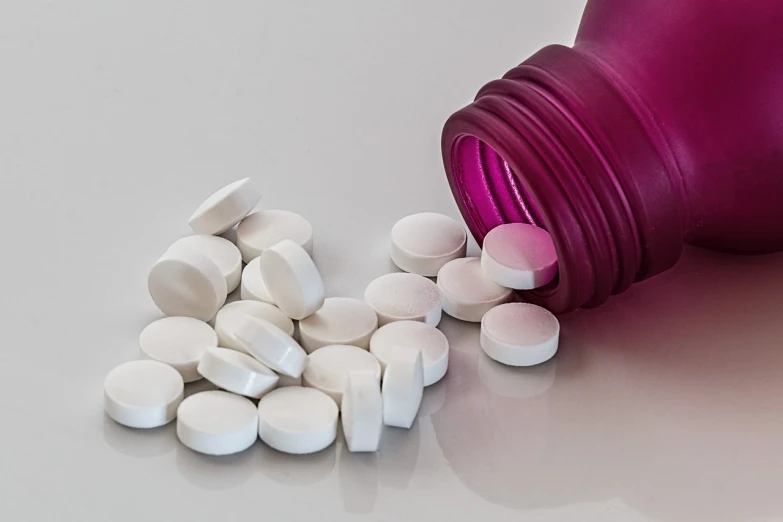 a close up of a bottle of pills on a table, by Mirko Rački, hdpe, illustratioin, shoulder, white