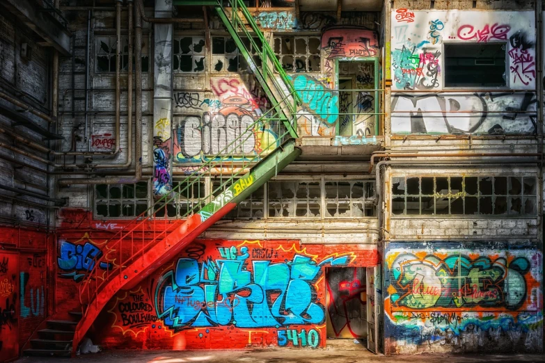 a red fire hydrant sitting in front of a building covered in graffiti, graffiti art, flickr, highrise made up staircases, tonemapped, abandoned night hangar, vibrant red and green colours