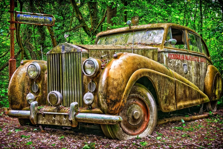 an old car is parked in the woods, by Richard Carline, trending on pixabay, photorealism, extremely opulent, richly textured, colourised, rides
