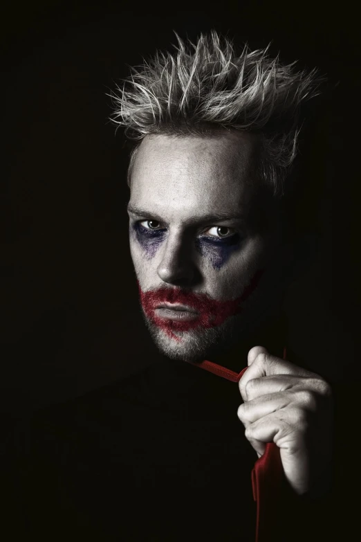 a close up of a person holding a toothbrush, a photo, inspired by James Bolivar Manson, shock art, portrait of joker, blonde british man, professional retouch, jesse pinkman as spider-man