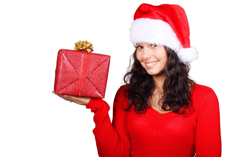 a woman in a santa hat holding a red present, istockphoto, customers, holding a stuff, attractive girl