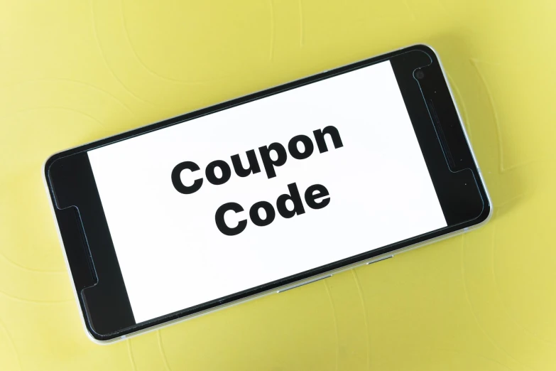 a cell phone with the text coup code on it, a stock photo, pixabay, limited time offer, on yellow paper, 🔥 😎 🕹️ 👀 :2, health