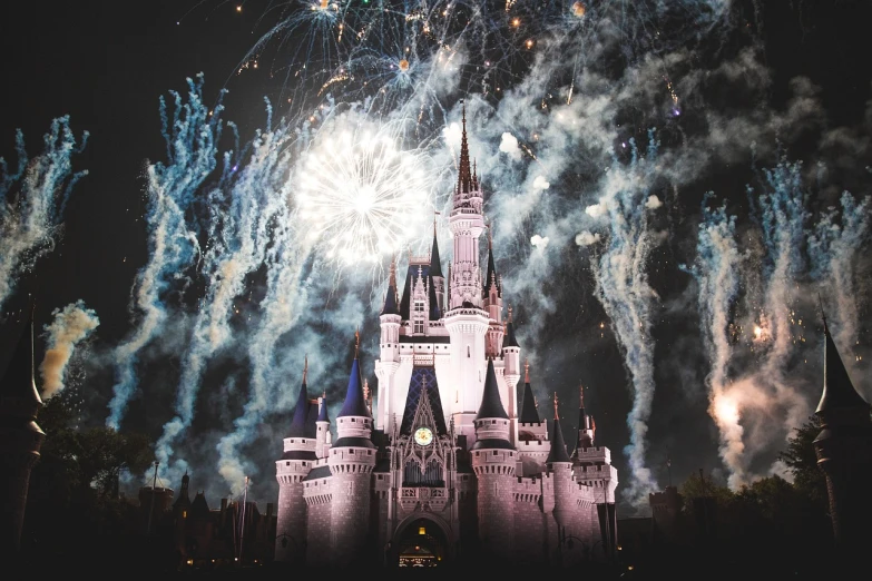 a castle with a lot of fireworks in the sky, a picture, inspired by disney, pexels, magical realism, vintage disney, usa-sep 20, disney character, my home