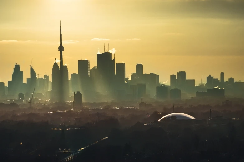 a view of a city from the top of a hill, by Matt Stewart, shutterstock, cn tower, city mist softlight, sun on zenith, aussie