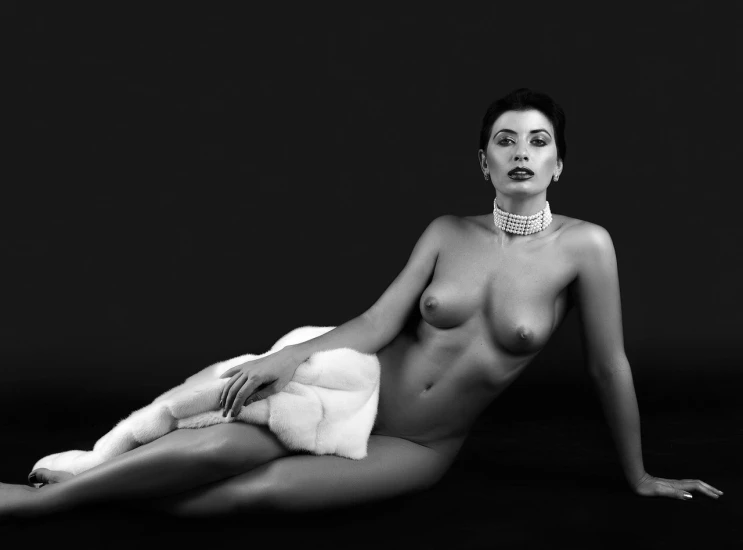 a black and white photo of a naked woman, a black and white photo, inspired by Peter Basch, fine art, detailed white fur, charli xcx, peter kemp, white soft leather model