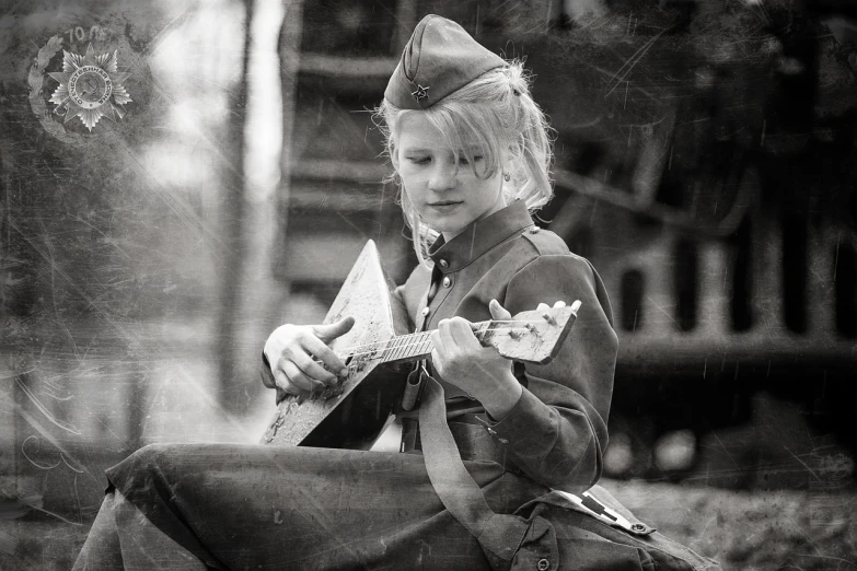 a black and white photo of a little girl playing a guitar, a portrait, inspired by Katia Chausheva, dieselpunk soldier girl, historical reenactment, scout boy, ww2 photo