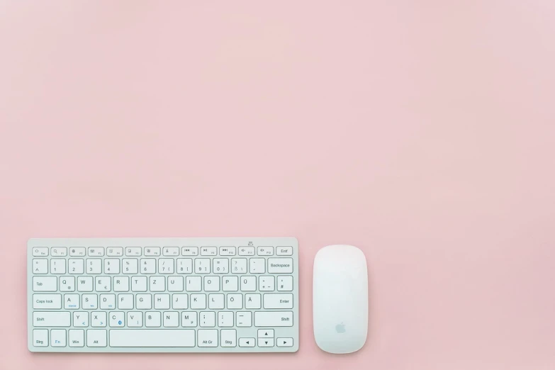 a computer keyboard and mouse on a pink surface, a picture, by Alexander Brook, minimalism, white color, background image, mid riff, rails