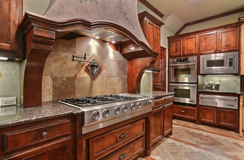 a stove top oven sitting inside of a kitchen, by George Barret, Jr., trending on pixabay, renaissance, brown wood cabinets, real estate photography, breathtaking masterpiece of art, gooey