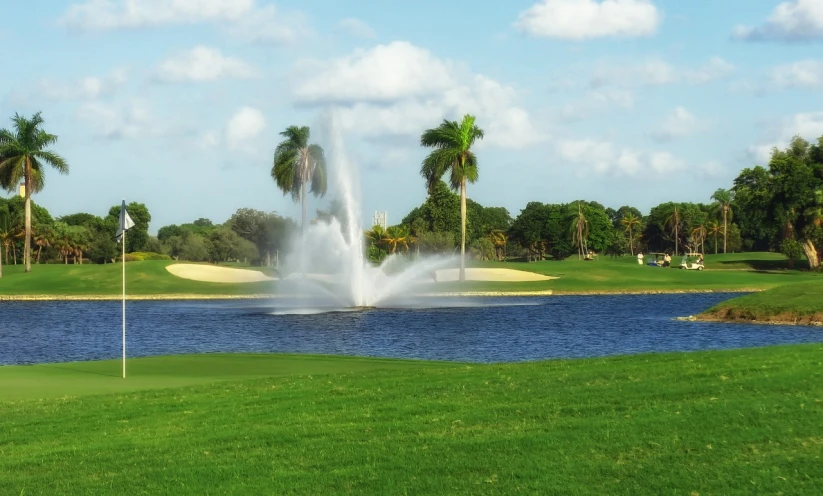 a water fountain in the middle of a golf course, by Scott M. Fischer, cg society contest winner, art deco, beautiful magical palm beach, from the distance, miami, round about to start