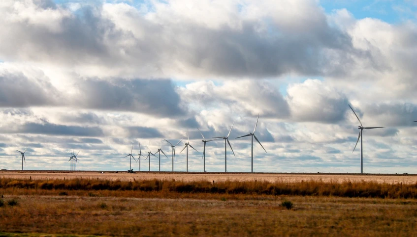 a group of wind turbines sitting on top of a dry grass field, tx, wikimedia commons, epic ultrawide shot, hyperealistic photo