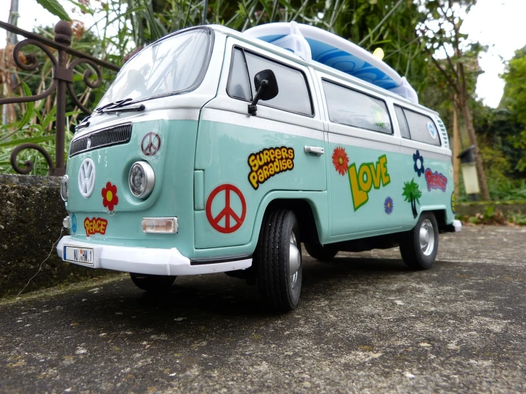 a blue and white van parked on the side of a road, by Ella Guru, flickr, hot toys, peace sign, super highly detailed, summer of love
