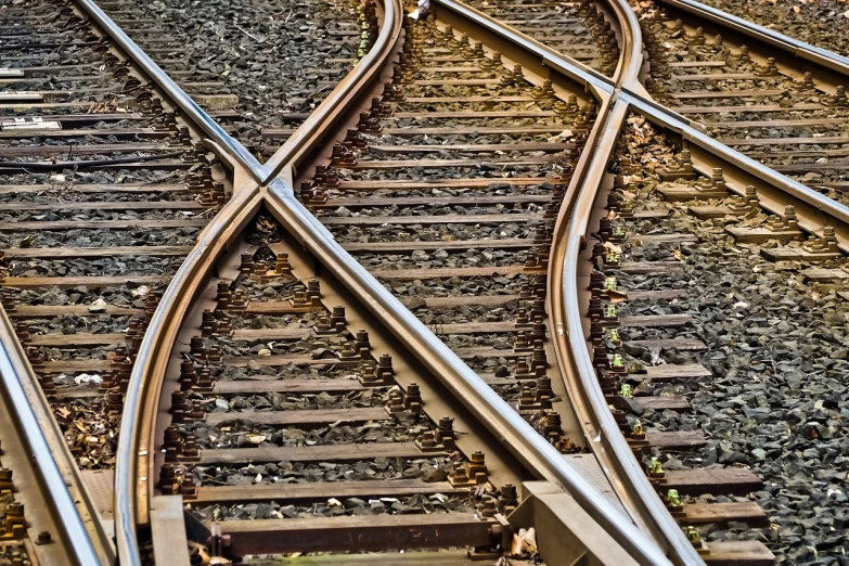 a couple of train tracks next to each other, by Richard Carline, precisionism, dynamic curves, hdr detail, version 3, intercrossed