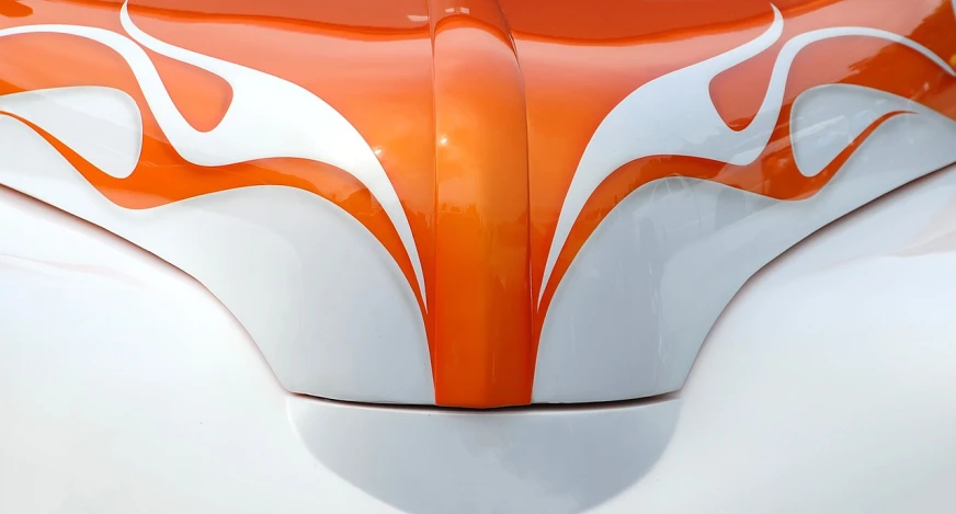 an orange and white motorcycle with flames painted on it, an abstract sculpture, by Doug Ohlson, flickr, precisionism, 1 9 7 0 s car window closeup, smooth symmetrical chin, white and orange, fiberglass