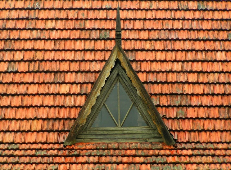 a roof with a cross on top of it, by Bernardino Mei, shutterstock, renaissance, triangular face, vibrant but dreary orange, complete window!, detail texture