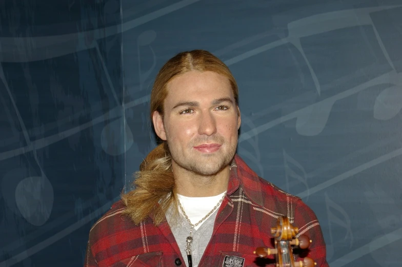 a man with long hair holding a violin, inspired by Kurt Trampedach, antony starr, long blond braided hair, wax figure, 1 / 2 headshot