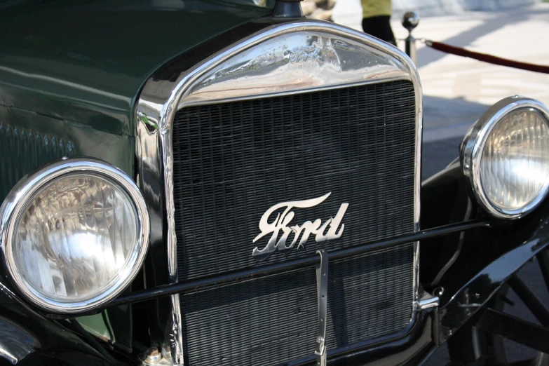 a close up of the front of a vintage car, inspired by Henry Justice Ford, flickr, truck, 1 9 2 0, ford fusion, marbella